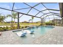 Relaxing pool and spa with covered lanai and water features at 4534 Trento Pl, Bradenton, FL 34211