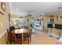 Bright living room features a dining area and open floor plan at 4802 51St W St # 1304, Bradenton, FL 34210
