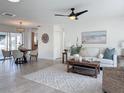 Bright and airy living room with a cozy seating area and dining space at 5011 Mangrove Point Rd, Bradenton, FL 34210