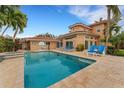 Inviting pool area with lounge chairs and spa at 5376 Shadow Lawn Dr, Sarasota, FL 34242
