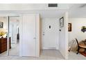 Apartment entryway with closet and interior door at 618 Bird Bay S Dr # 201, Venice, FL 34285