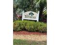 The Terraces community entrance sign at 6505 Stone River Rd # 202, Bradenton, FL 34203