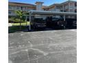 Covered parking spaces available for residents at 6505 Stone River Rd # 202, Bradenton, FL 34203