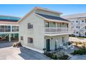 Two-story house with balcony and patio at 709 Barcelona Ave # D & E, Venice, FL 34285