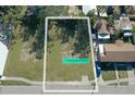 Vacant lot ready for new construction, near existing homes at 1744 10Th St, Sarasota, FL 34236