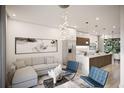 Open floor plan living room and kitchen with modern appliances at 2194 Fruitville Rd, Sarasota, FL 34237