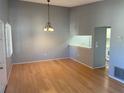 Spacious dining area with light walls and wood-look floors at 3743 59Th W Ave # 3743, Bradenton, FL 34210