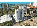 Aerial view of a modern building in a city setting at 300 S Pineapple Ave # 801N, Sarasota, FL 34236