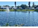 Single-story home's serene lakefront view at 4511 Lexington Cir, Bradenton, FL 34210