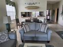 Casual dining area with seating for four and kitchen access at 5492 Hampstead Heath # 11, Sarasota, FL 34235