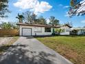 Updated single story home with a long driveway at 2586 Tami Sola St, Sarasota, FL 34237