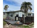 Mobile home with deck and bicycle at 2601 Gulf N Dr # 510, Bradenton Beach, FL 34217