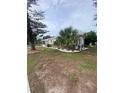 House with side yard and mature landscaping at 2928 Bahia Vista St, Sarasota, FL 34239