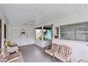 Relaxing covered patio with seating area at 2928 Bahia Vista St, Sarasota, FL 34239
