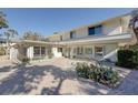 Another view of the house showcasing its curb appeal and landscaping at 3712 Sandspur Ln, Nokomis, FL 34275