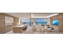 Open concept kitchen and living area with water views at 555 Quay Commons # 402, Sarasota, FL 34236