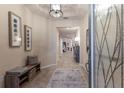 Bright and spacious entryway with decorative accents at 5817 Hevena Ct, Palmetto, FL 34221