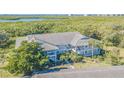 Condo building with parking and landscaping, near water at 610 Estuary Dr # 610, Bradenton, FL 34209