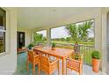 Spacious covered patio with golf course views at 9435 Discovery Ter # 202D, Bradenton, FL 34212