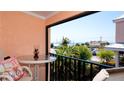 Relaxing balcony view of the beach and oceanfront neighborhood at 117 10Th N St # 122, Bradenton Beach, FL 34217