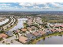 Bird's-eye view of upscale houses and waterways at 16621 Berwick Ter, Lakewood Ranch, FL 34202