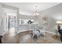 Bright dining area with a table and chairs, adjacent to the kitchen at 4202 Caddie E Dr # 102, Bradenton, FL 34203