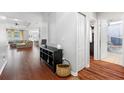 View down a hallway showing the living room and bathroom at 5007 Elmhurst Ln, Palmetto, FL 34221