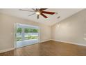 Spacious dining area with sliding glass doors leading to the patio at 5687 Milton Ave, Sarasota, FL 34243