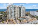 Luxury condo building with pool and parking at 800 N Tamiami Trl # 1502, Sarasota, FL 34236