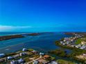 Bird's eye view of waterfront home and surrounding properties at 10428 Marion St, Englewood, FL 34224