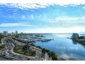 Stunning aerial view of waterfront property and marina at 1111 N Gulfstream Ave # 14C, Sarasota, FL 34236