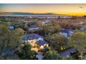 Aerial view of a house and neighborhood at sunset at 1718 Prospect St, Sarasota, FL 34239