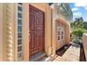 Elegant front door entrance with glass block accents at 221 Tenacity Ln, Sarasota, FL 34242