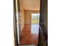 Condo entryway with tiled floor at 2636 Hidden Lake N Dr # G, Sarasota, FL 34237