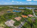 Aerial view showcasing the house's location and surrounding landscape at 790 Shadow Bay Way, Osprey, FL 34229