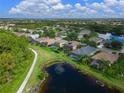 House with pool in a neighborhood with a lake at 8108 Haven Harbour Way, Bradenton, FL 34212