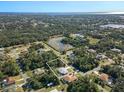 Property situated in a residential area with a pond nearby at 18314 Koala Ave, Port Charlotte, FL 33948