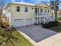 Two-story house with double garage and a spacious driveway at 4338 14Th Street Cir, Palmetto, FL 34221