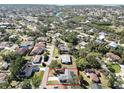 Aerial view showcasing home's location in a residential neighborhood at 480 Azalea Rd, Venice, FL 34293