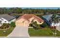 Single-Gathering home with tile roof and two-car garage, near water at 4881 Flagstone Dr, Sarasota, FL 34238