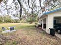 Spacious backyard with a patio and plenty of open space at 5507 28Th W St, Bradenton, FL 34207