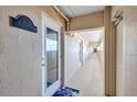 Condo hallway with access to unit 902 of Eagles Rest building at 6140 Midnight Pass Rd # 902, Sarasota, FL 34242