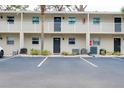 Condo building showcasing multiple entrances and parking at 972 La Costa Cir # 5, Sarasota, FL 34237