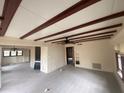 Bright living room featuring exposed wood beams at 175 Island Cir, Sarasota, FL 34242