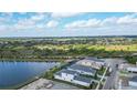 Community overview, showcasing lake and homes at 4517 Mondrian Ct, Sarasota, FL 34240