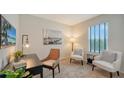 Home office featuring two chairs, a desk, and large window at 4519 Boxelder Avenue, Parrish, FL 34219