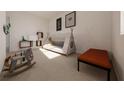 Playful bedroom with teepee bed, toys, and shelving at 4523 Boxelder Avenue, Parrish, FL 34219