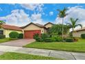 Attractive single-story home with lush landscaping at 5931 Caspian Tern Dr, Sarasota, FL 34238