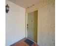 Condo entry with light-colored door and tile floor at 6262 142Nd N Ave # 805, Clearwater, FL 33760