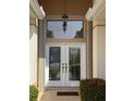 Double entry doors with etched glass and sidelights at 636 Lakescene Drive Dr, Venice, FL 34293